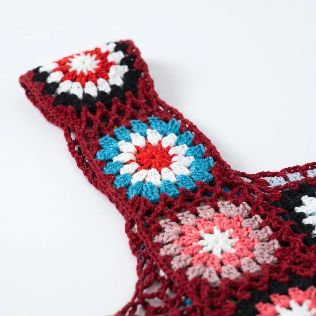 Colorful floral open knit crochet crop top for women, vibrant summer & beach vacation style.