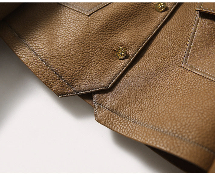 Fashion-forward women's cropped faux leather jacket. Lapel collar modern statement outerwear.