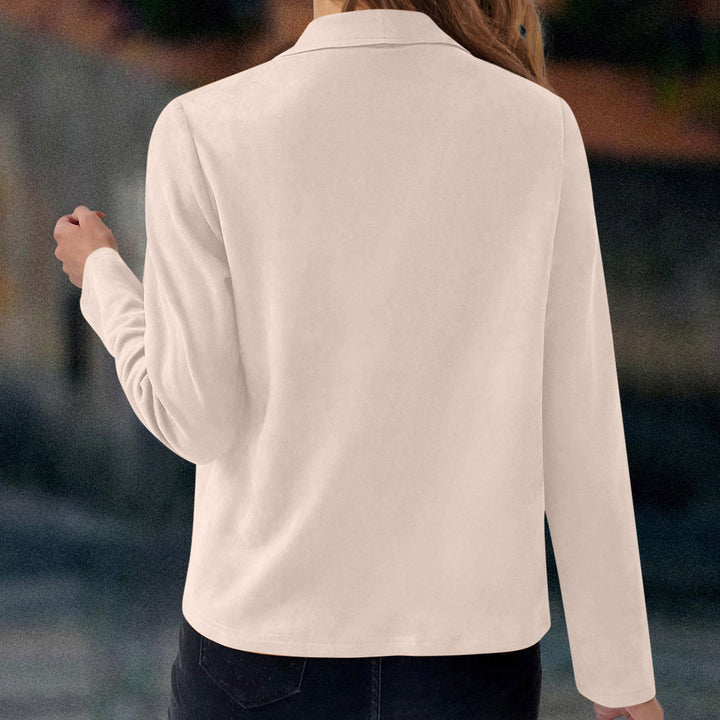 Stylish women's cropped jacket featuring a draped open front & waterfall lapel. Ideal for versatile layering.