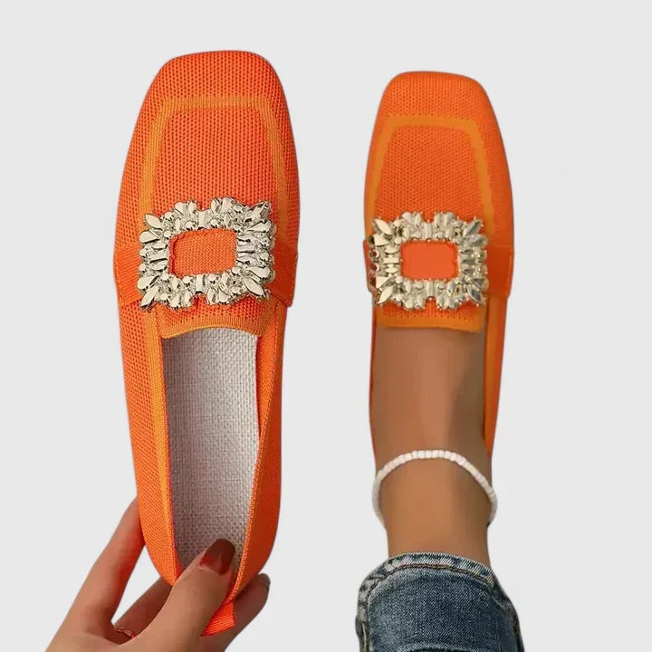 Chic women's flat loafers with a square toe and sparkling crystal detail. Versatile for dressy or casual wear.
