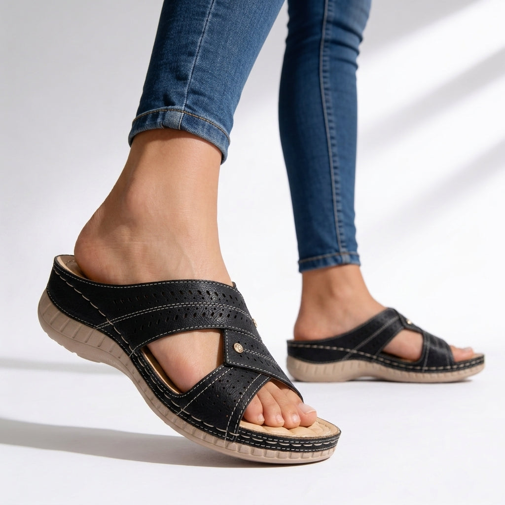 Comfortable women's wedge sandals with cushioned footbed & stylish crossover design, ideal for summer walks.