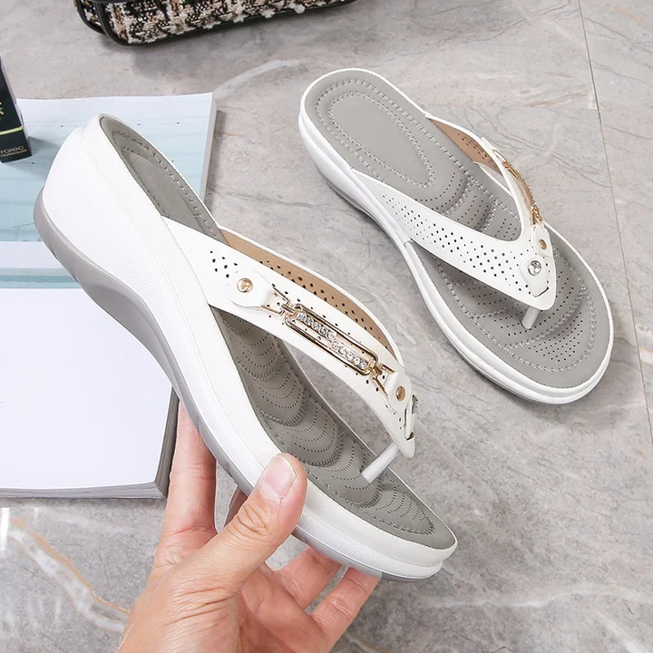 Women's cushioned flip flop sandals, perfect for casual summer wear & beach outings. Comfortable slip-on daily footwear.