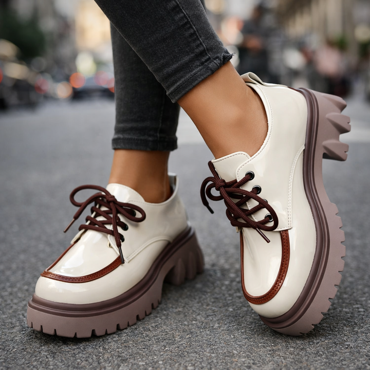 Stylish women's lace-up fashion shoes with a chunky lug sole and comfortable platform design.