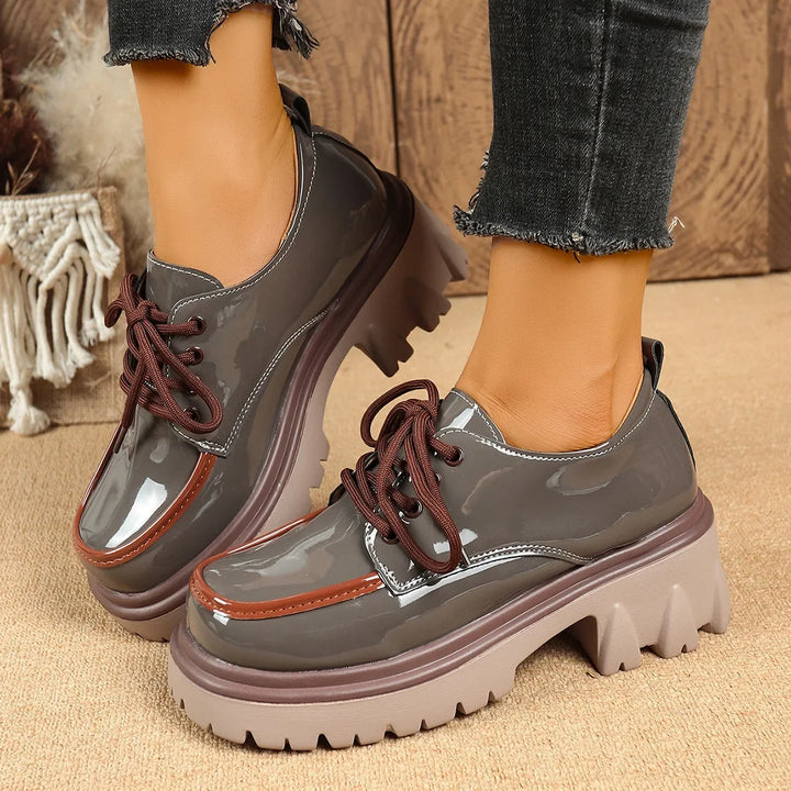 Chunky lug sole women's platform shoes, lace-up style for a fashionable and comfortable look.