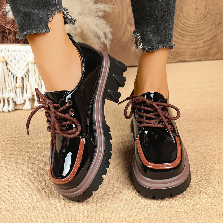 Fashionable women's lace-up platform shoes with a rugged lug sole and cushioned interior.
