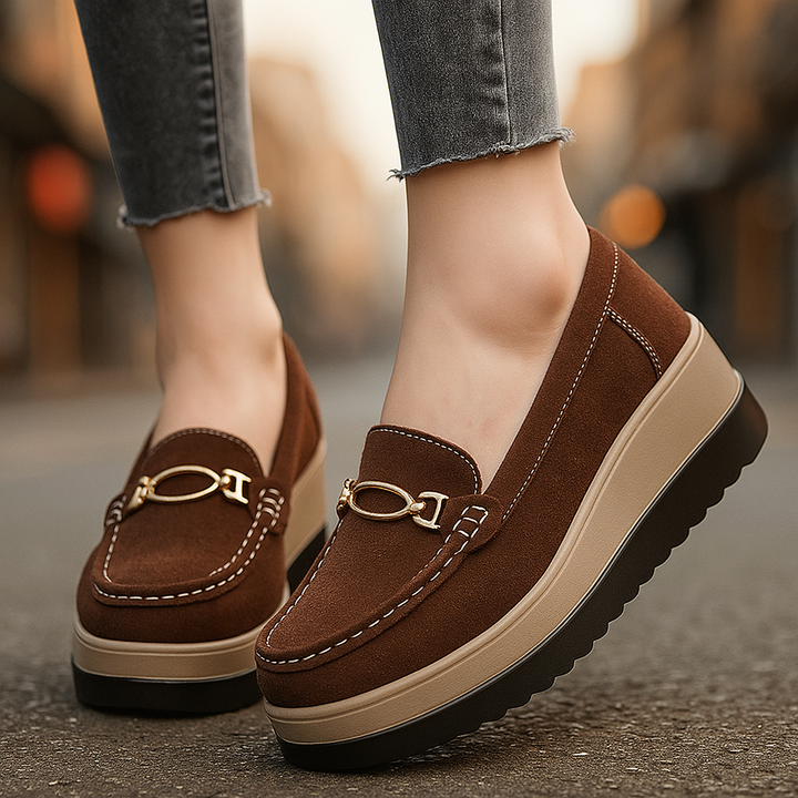 Chic women's platform loafers. Black cushioned slip-on shoes offering orthopedic support & stylish casual footwear.