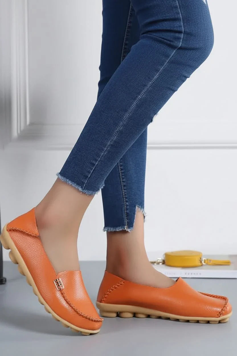 Comfortable women's slip-on flat shoes, cushioned with a round toe for effortless daily wear.
