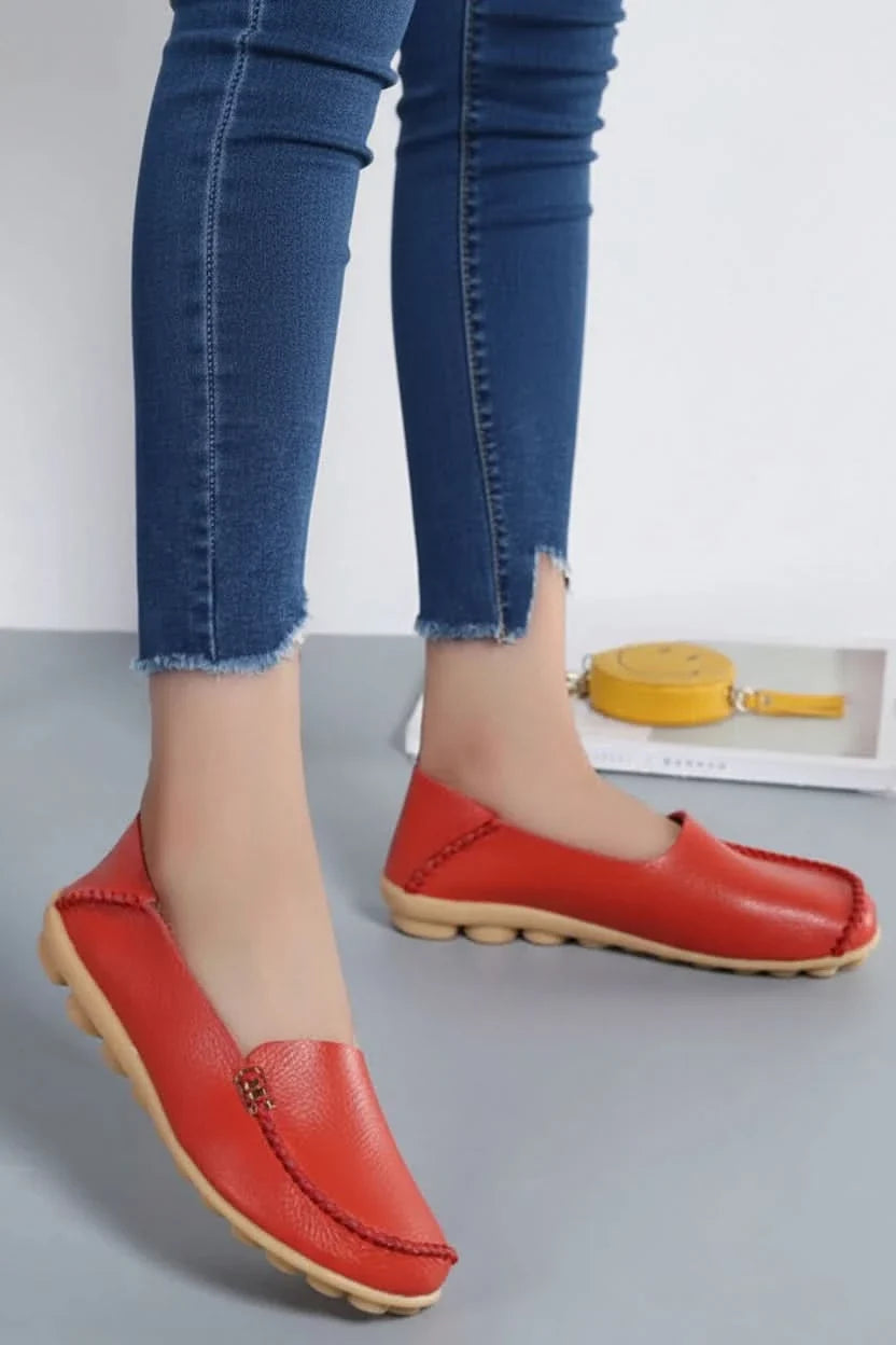 Elegant women's round toe flats, cushioned for sustained comfort, suitable for work or leisure.