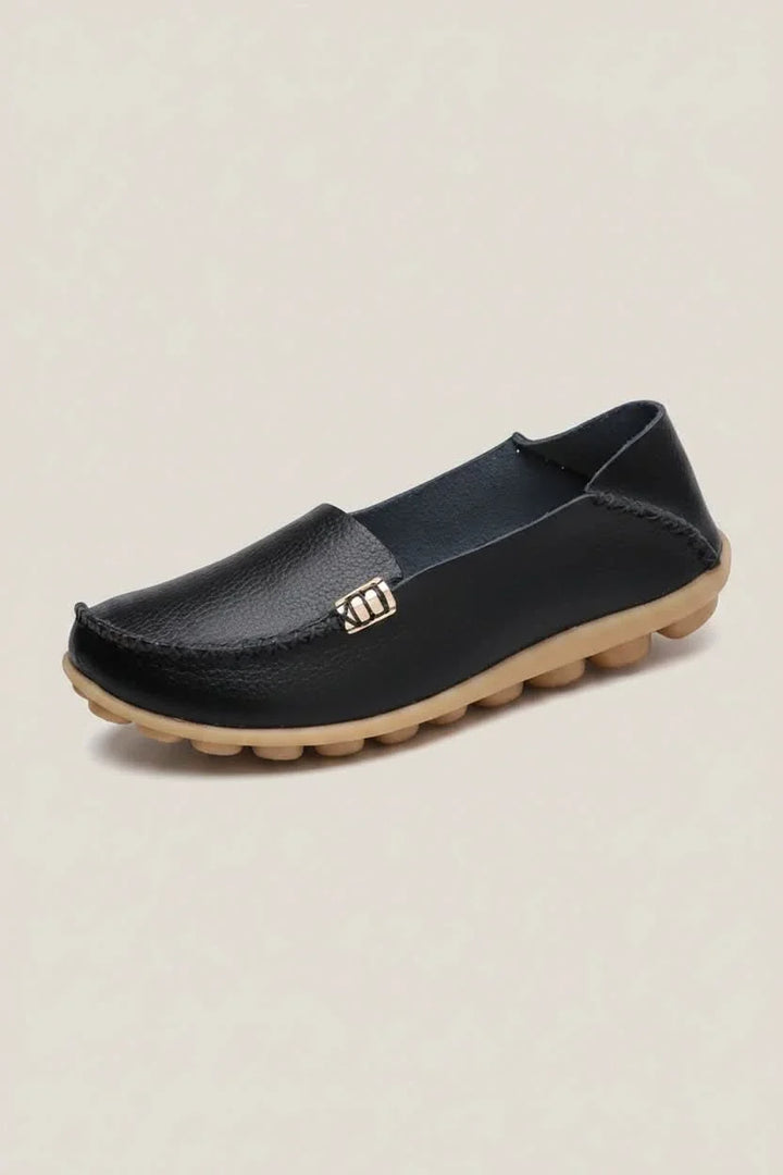 Soft cushioned women's flat shoes, featuring a round toe design for superior comfort & fit.
