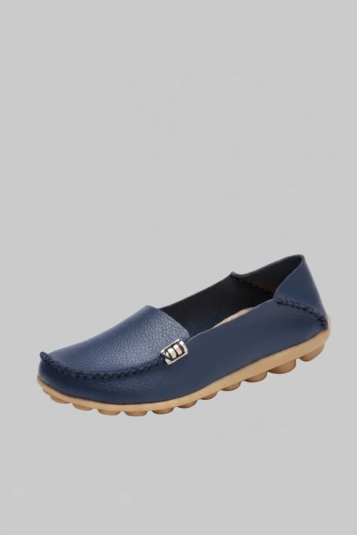 Smooth women's slip-on round toe flats, deeply cushioned for ultimate comfort and support.