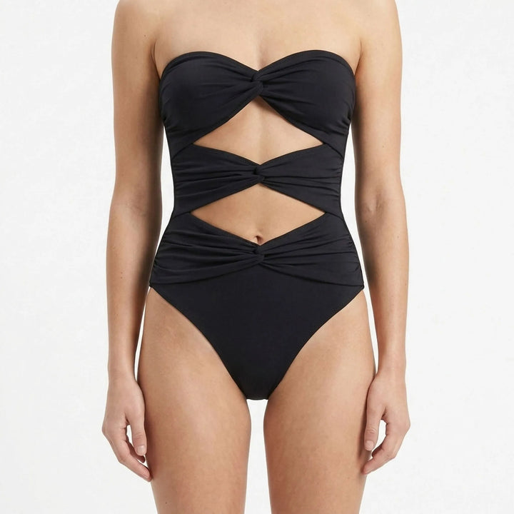 Fashionable women's cutout swimwear set, ideal for beach holidays and resorts.