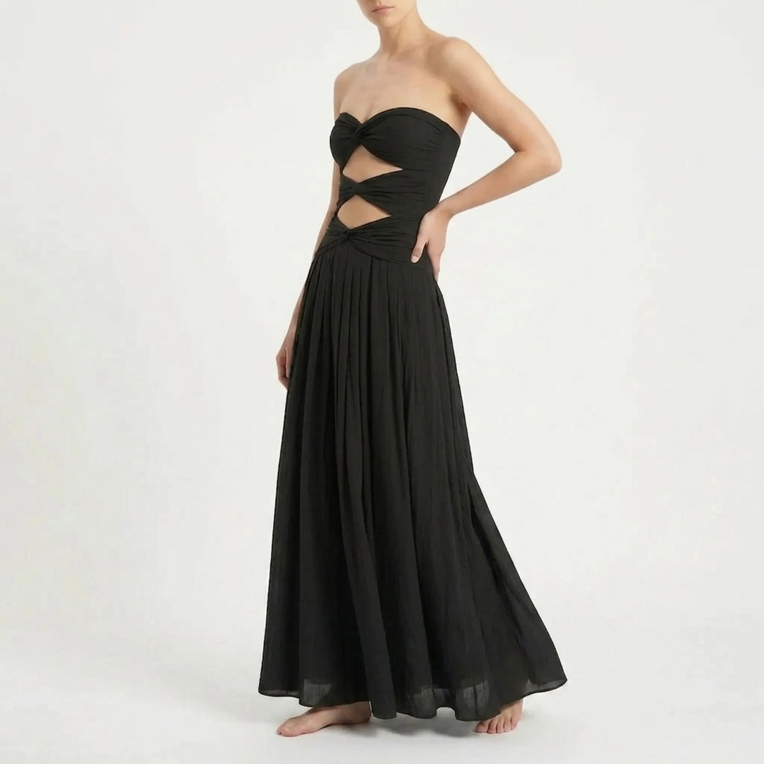 Women's stylish beach ensemble: cutout swimsuit with a lightweight long skirt cover-up.