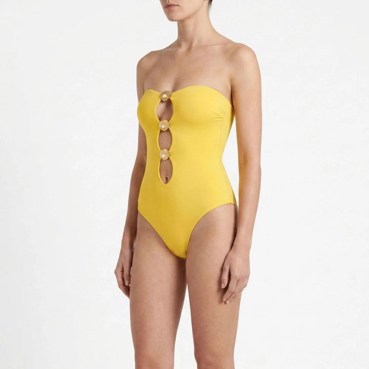 Women's complete beach ensemble: cutout swimwear with a comfortable long skirt.