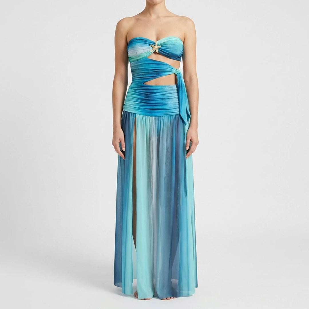 Poolside outfit: women's cutout bandeau swimsuit paired with a stylish long skirt.