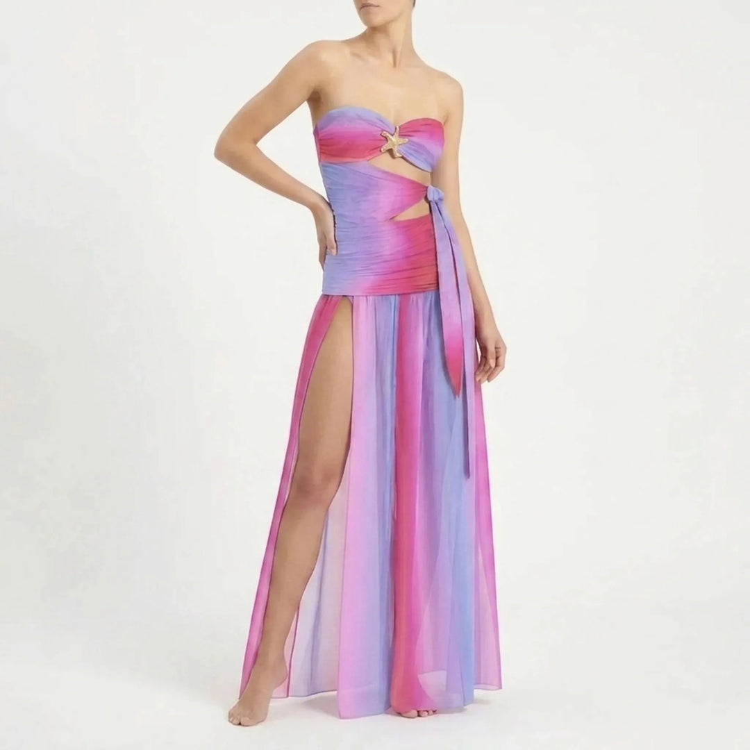 Vacation-ready women's cutout swimsuit and coordinated long skirt cover-up set.