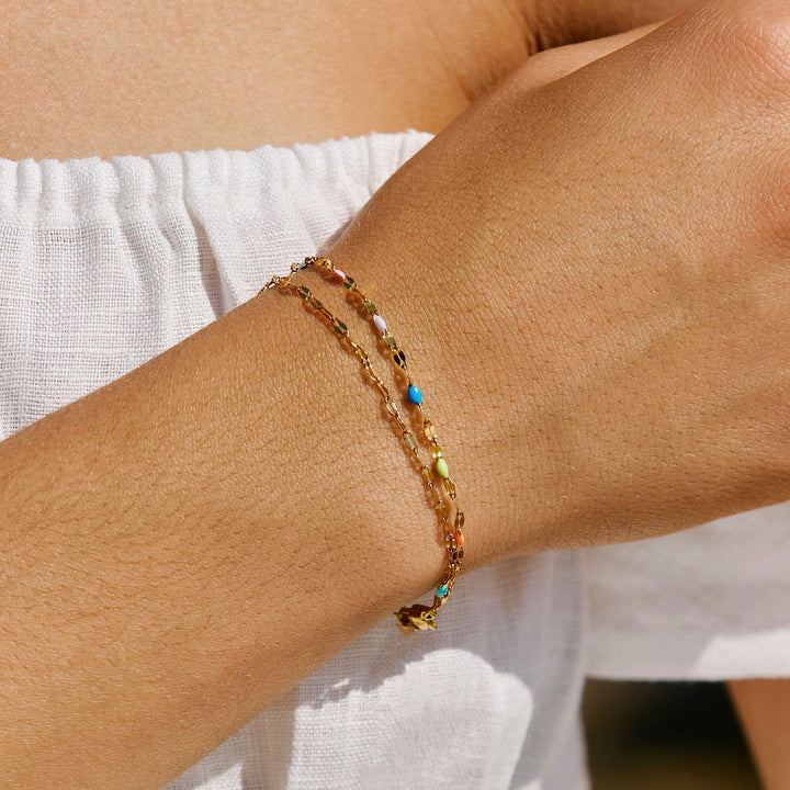 Women's dainty rainbow chain bracelet with colorful beads, adjustable fit. Perfect minimalist jewelry gift.