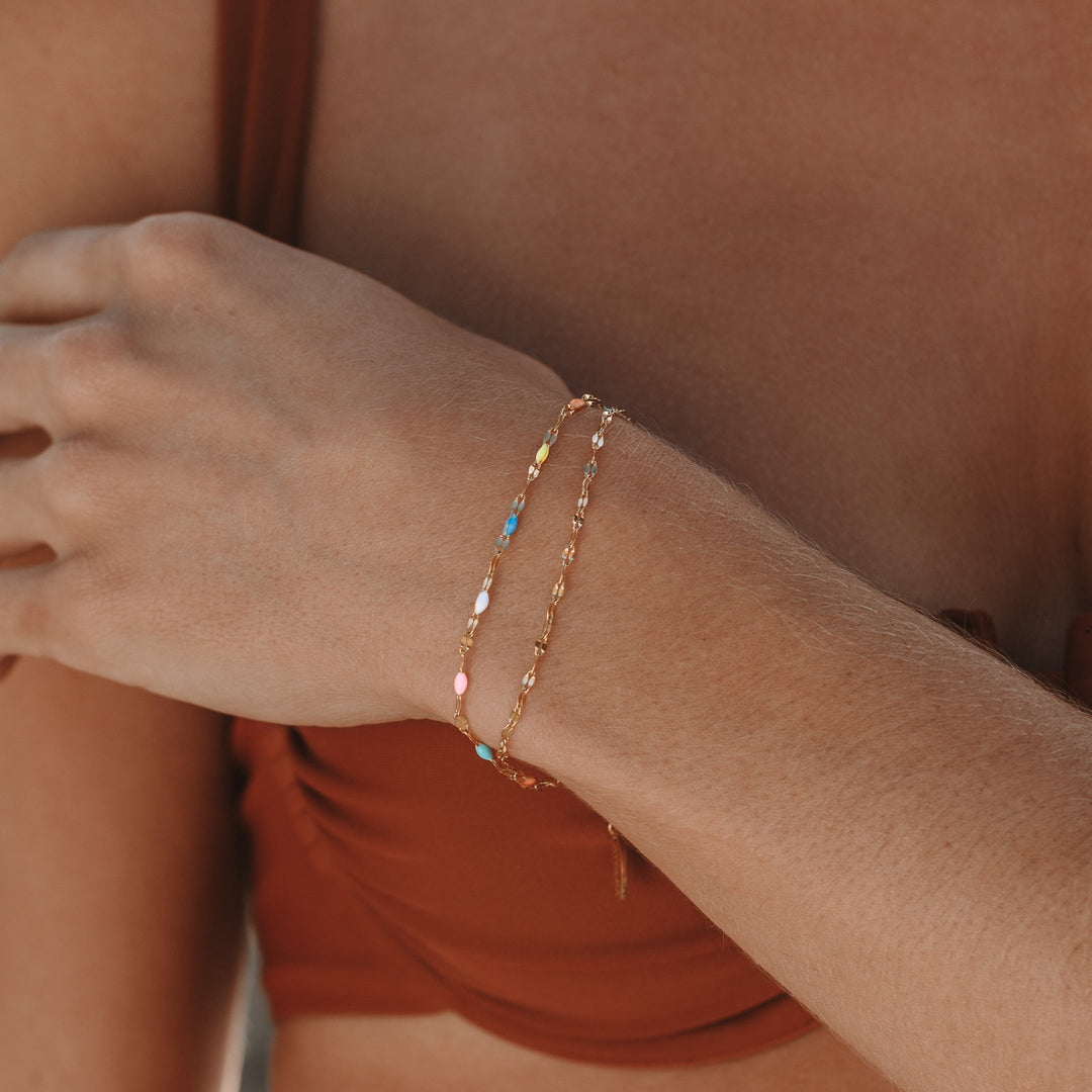 Boho style women's rainbow chain bracelet, delicate and colorful. Adjustable minimalist jewelry for everyday.
