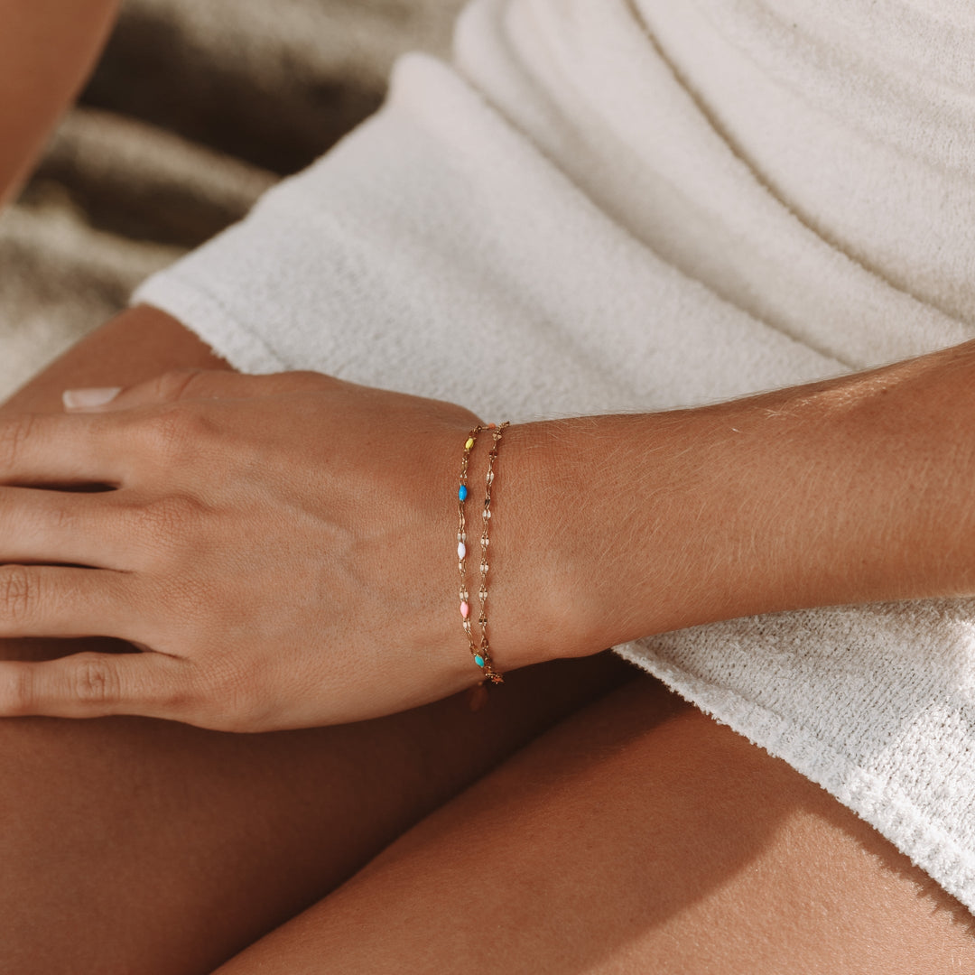 Delicate women's rainbow chain bracelet, vibrant colors. Versatile dainty jewelry for women.