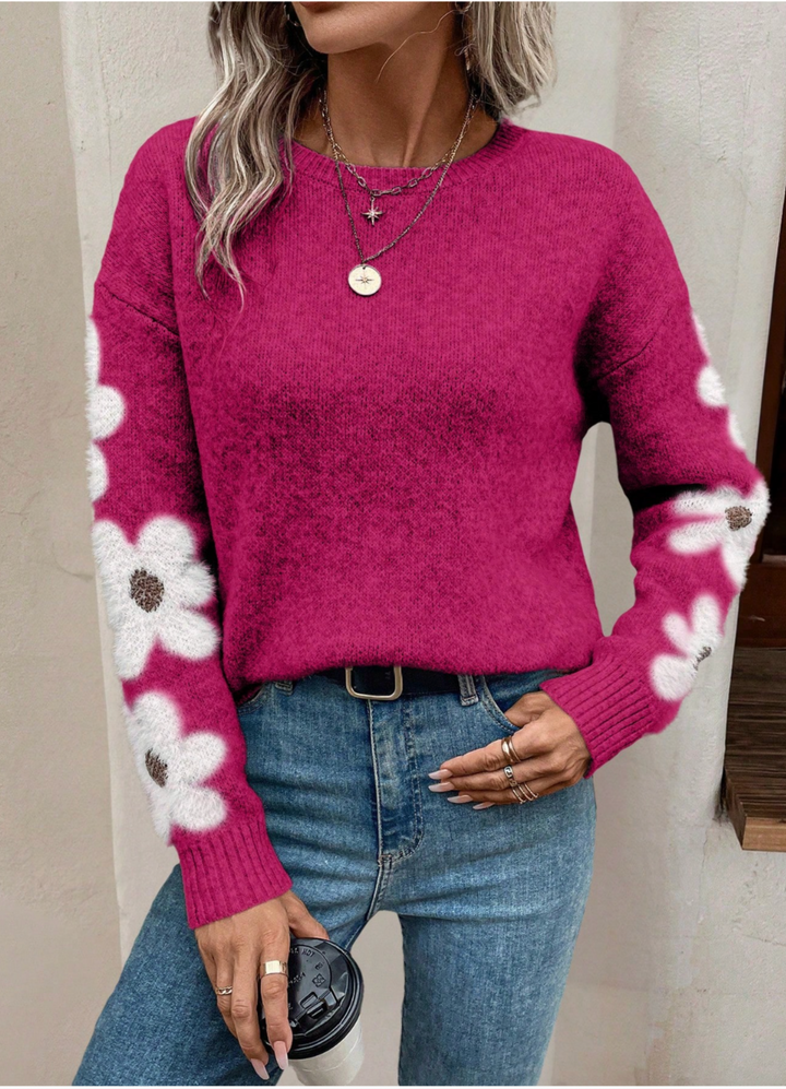 Relaxed fit women's daisy sweater. Drop shoulder, floral design, ideal for autumn wear.