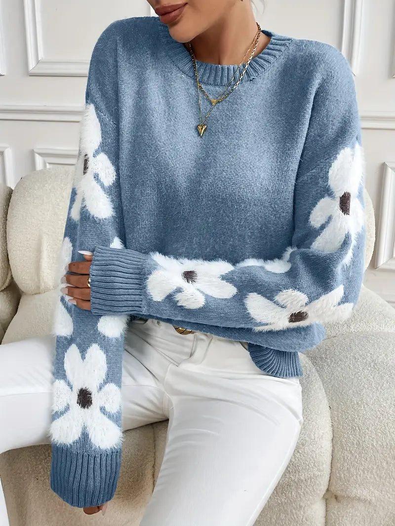 Stylish women's drop shoulder daisy sweater. Comfortable knitwear for winter fashion.