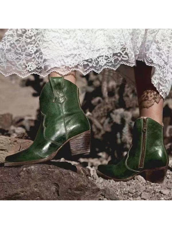 Fashionable women's dark green snip toe ankle boots. Side zip western cowgirl footwear with a sturdy block heel.