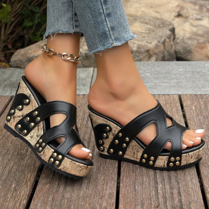 Stylish Davina Rise slip-on women's wedges with chic studded details, perfect for summer.