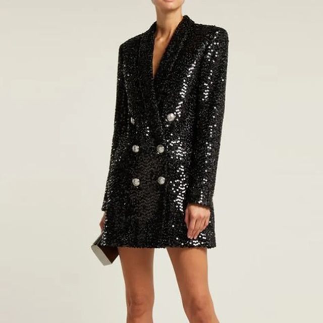 Dazzling women's sequin blazer jumpsuit, a chic party outfit & glamorous evening wear for special occasions.