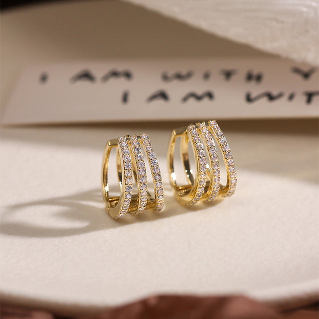 Women's dazzling brilliant statement earrings with sparkling crystals.
