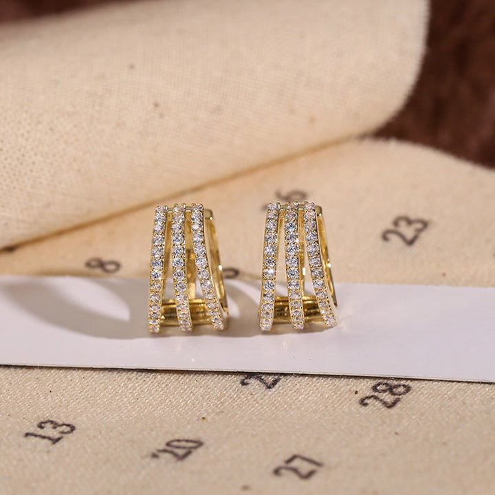 Dazzling women's crystal earrings, brilliant and shimmering dangle jewelry accessory.