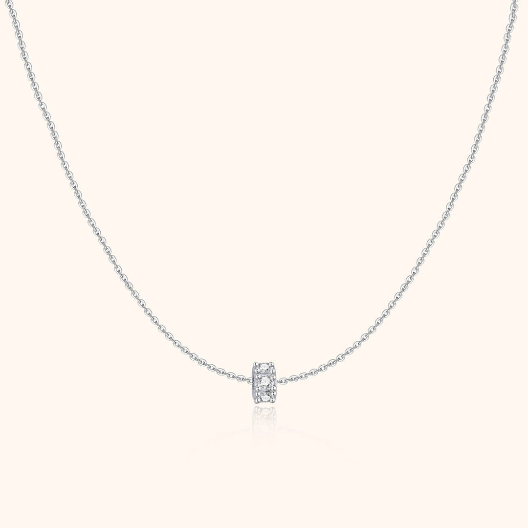 Elegant women's sterling silver circle necklace, gold-plated, featuring sparkling zirconia stones.