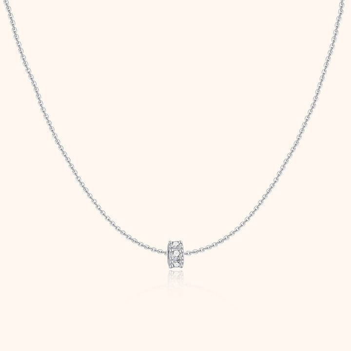 Elegant women's sterling silver circle necklace, gold-plated, featuring sparkling zirconia stones.