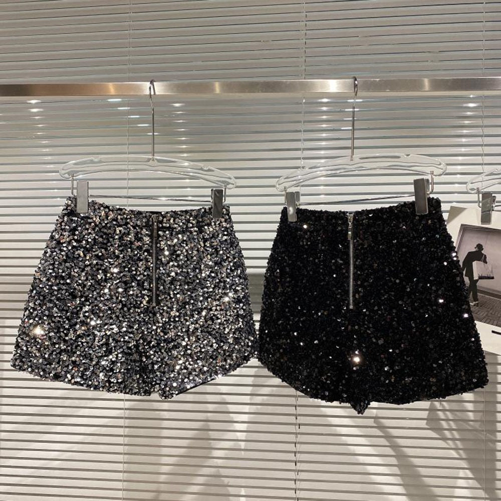 Trendy women's high waist bling shorts with dazzling sparkle, ideal for party wear & fashion-forward summer style.