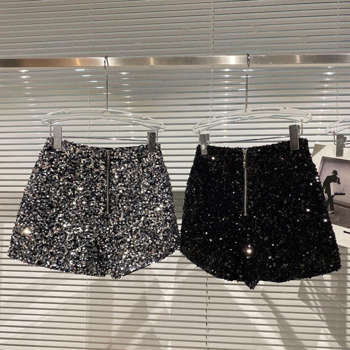 Trendy women's high waist bling shorts with dazzling sparkle, ideal for party wear & fashion-forward summer style.