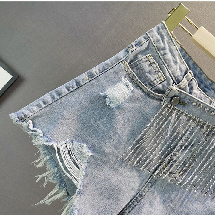 Stylish light blue high-waist shorts for women. Dazzling diamond accents make them ideal for casual chic & parties.