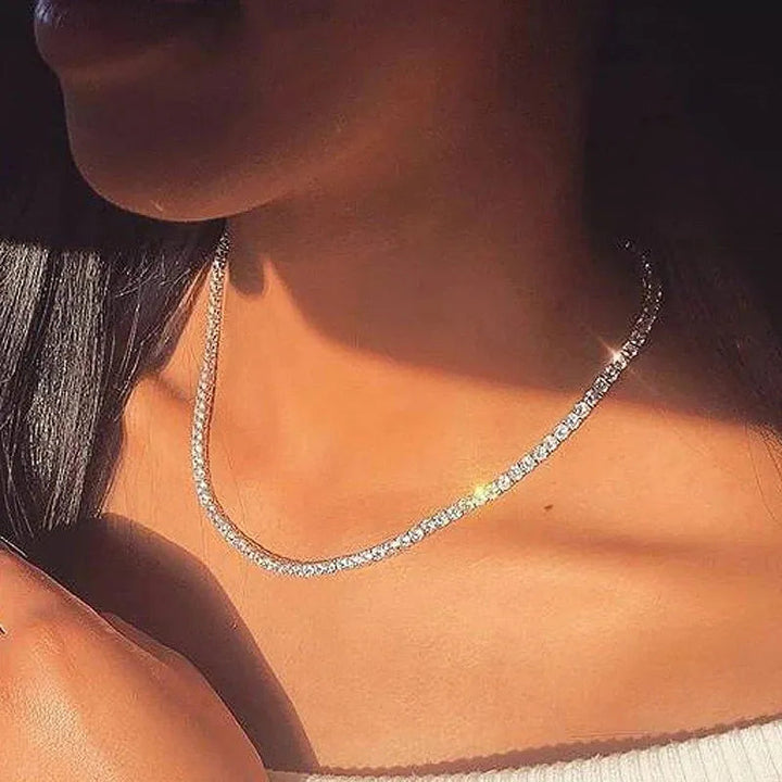Women's dazzling rhinestone tennis necklace, a classic elegant jewelry piece that sparkles brilliantly.
