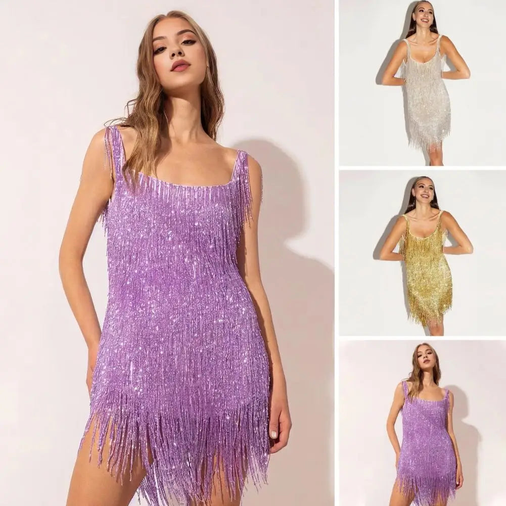 Trendy women's mini dress featuring dazzling sequins & playful fringe, perfect for parties.