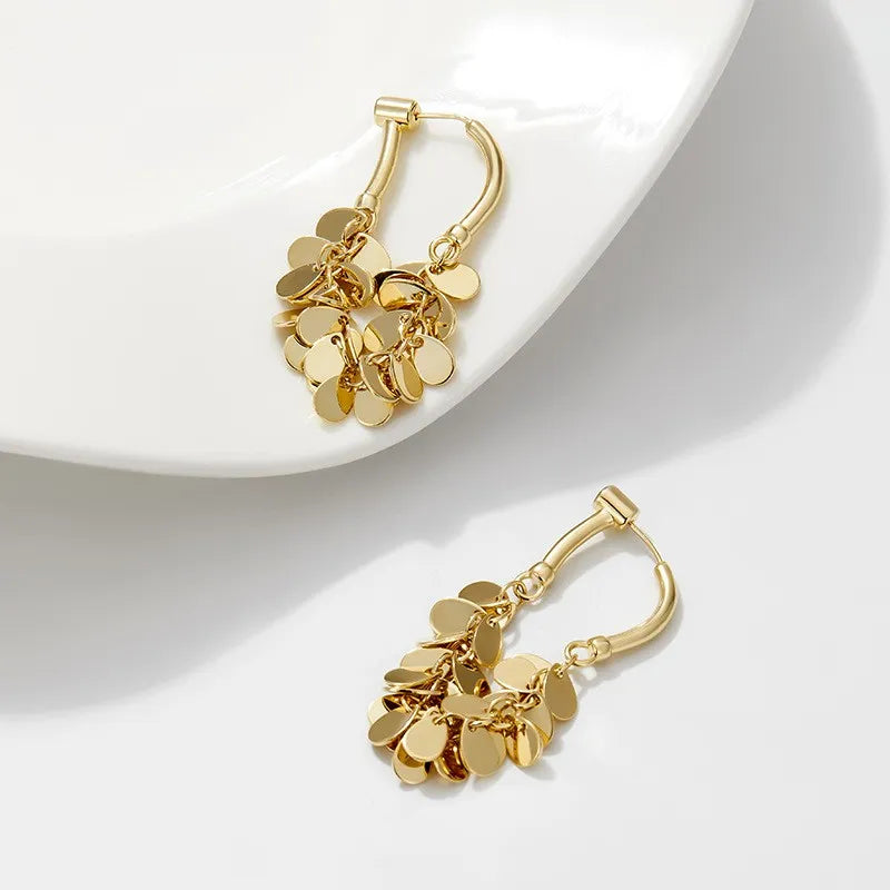 Dazzling sequin tassel drop earrings for women, featuring a sparkly design, perfect for party wear.