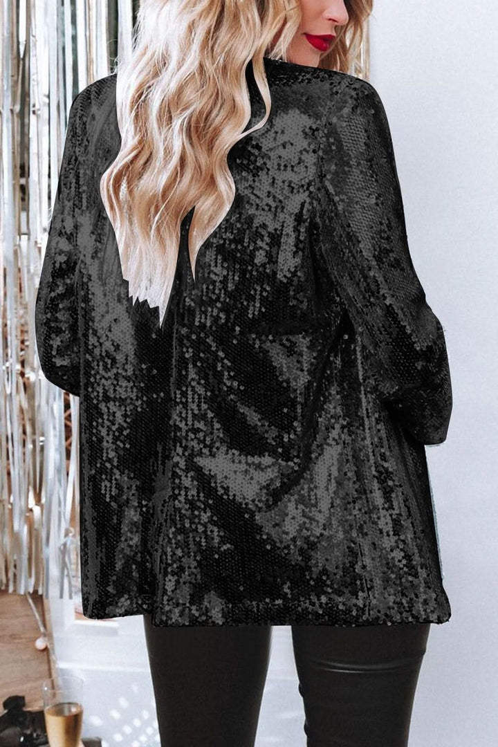 Stylish women's shimmering blazer with dazzling sparkle. Ideal for glamorous special occasion fashion.