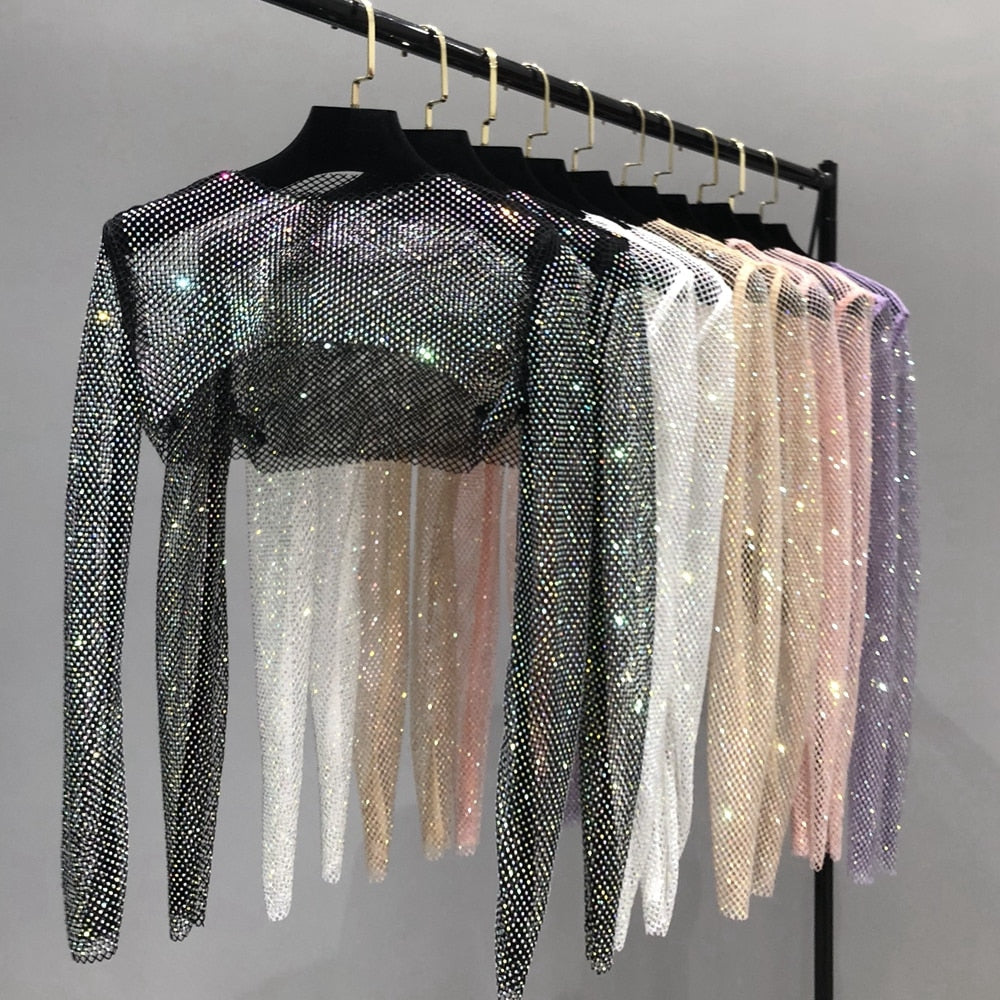 Women's dazzling shiny net party top, a glamorous statement piece for evening wear.