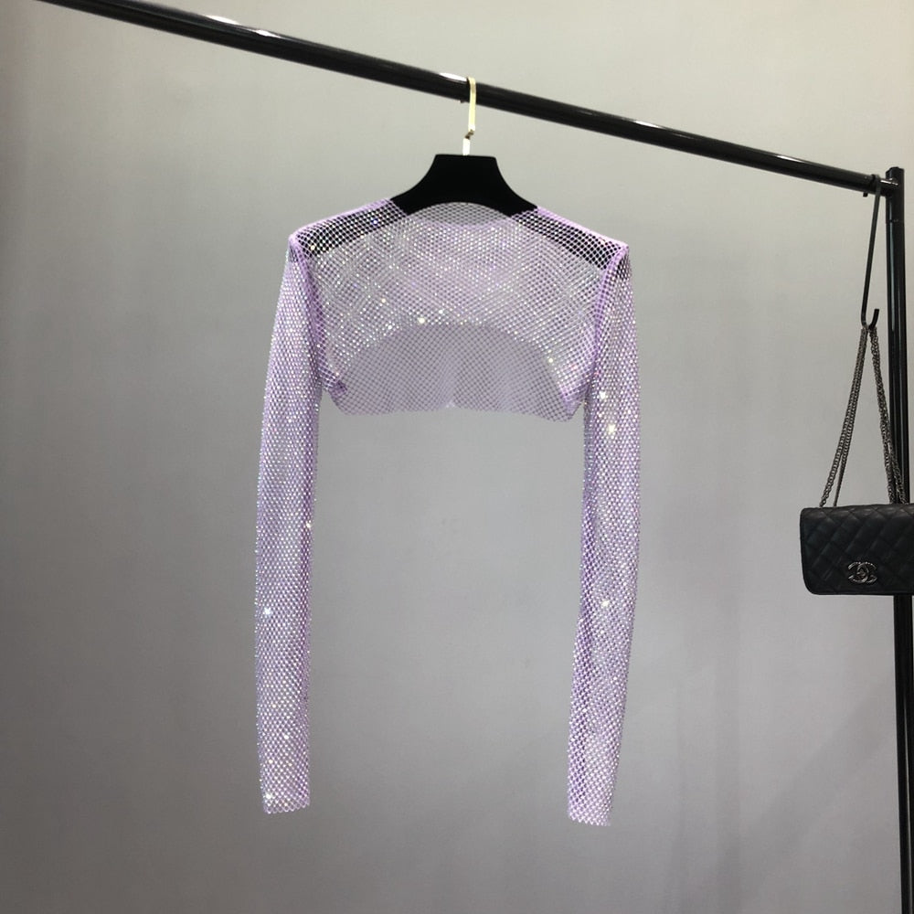 Dazzling women's shiny net party top, a chic choice for elegant evening fashion.