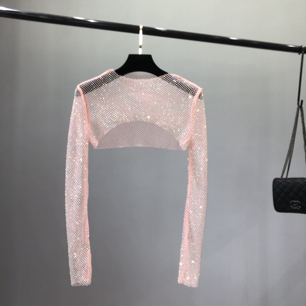 Glamorous women's net party top, featuring dazzling sparkle for evening style.