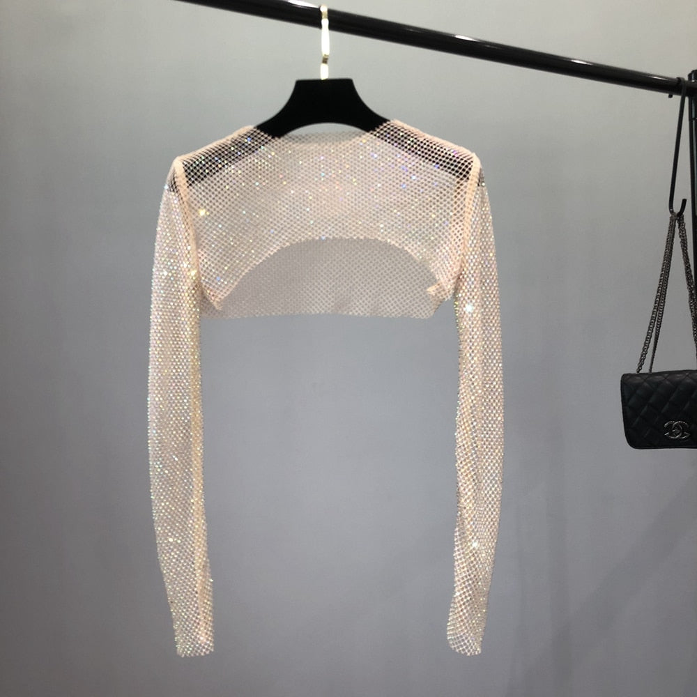 Shiny net party top for women, a dazzling statement piece for any evening event.