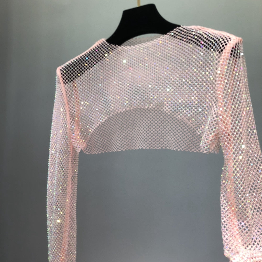 Sparkling and shiny women's net party top, perfect for dazzling evening wear.