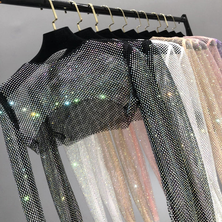 Women's dazzling net party top, an eye-catching statement for glamorous evening fashion.