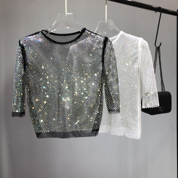 Women's dazzling shiny party t-shirt for nights out, sparkling glitter top, one size festive wear.