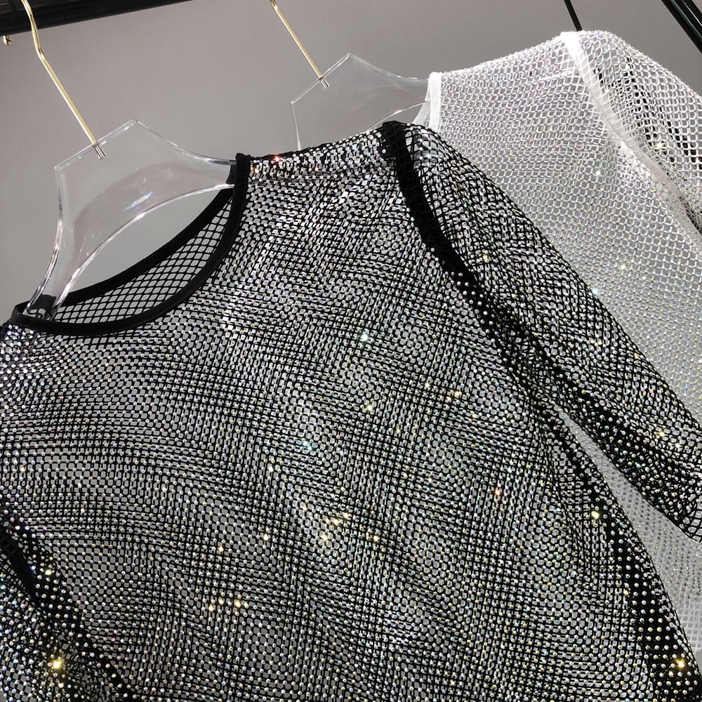 Women's versatile glitter shirt, a shiny party t-shirt suitable for dazzling nights out. One size.