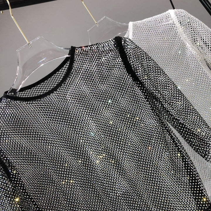 Women's versatile glitter shirt, a shiny party t-shirt suitable for dazzling nights out. One size.
