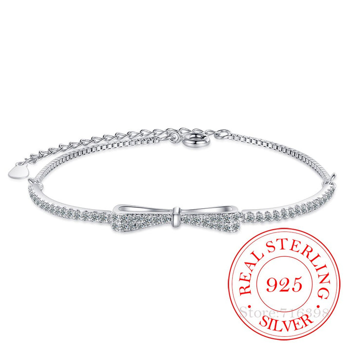 Women's dazzling zirconia silver tennis bracelet, elegant fine jewelry perfect for special occasions.