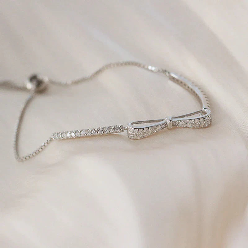 Elegant silver zirconia tennis bracelet, a dazzling gift for her. Perfect women's fine jewelry accessory.
