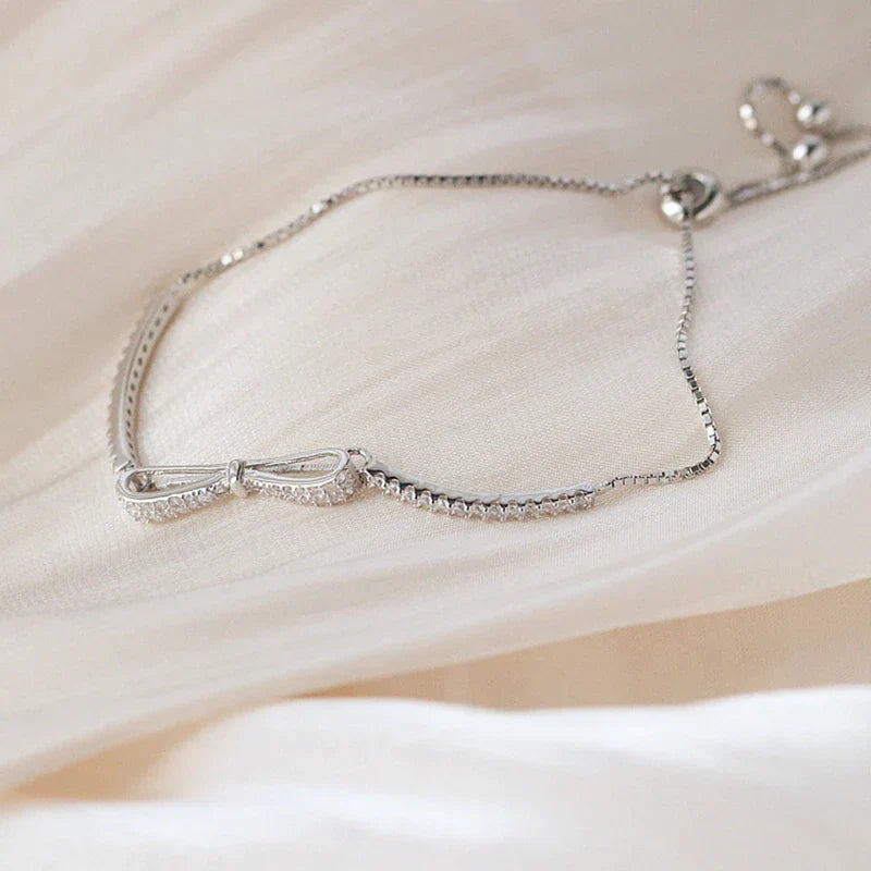 Luxury women's dazzling zirconia tennis bracelet in sterling silver, adding sparkling elegance to any outfit.